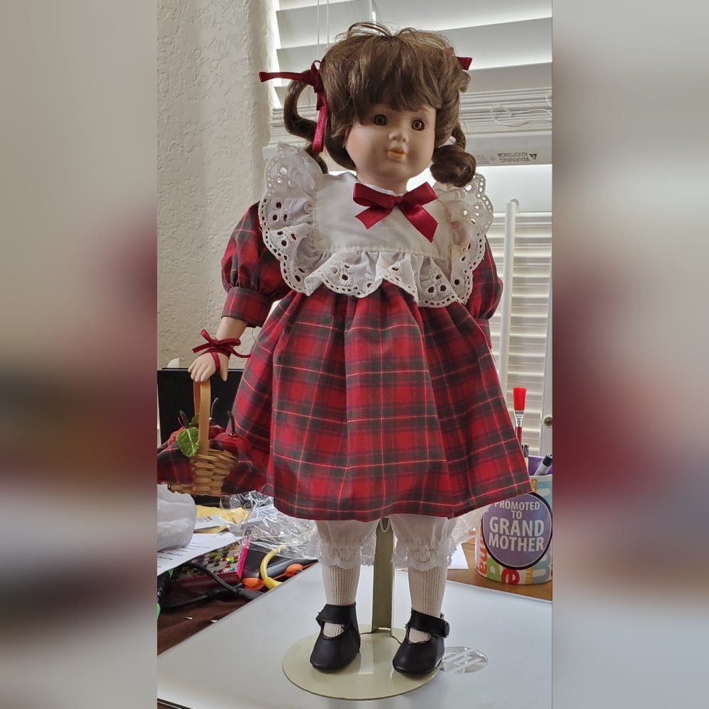 Apples &Curly Pigtails. She has Beautiful Brown Eyes &Carries a Basket of Apples